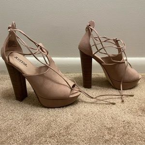 Soft pink color, ties up the leg, chunky high heels